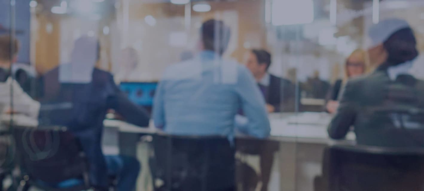 team of professionals sitting in office