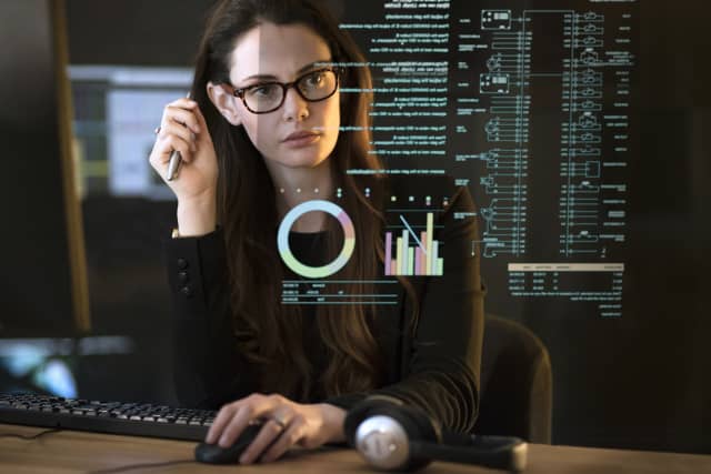 professional woman looking at digital file